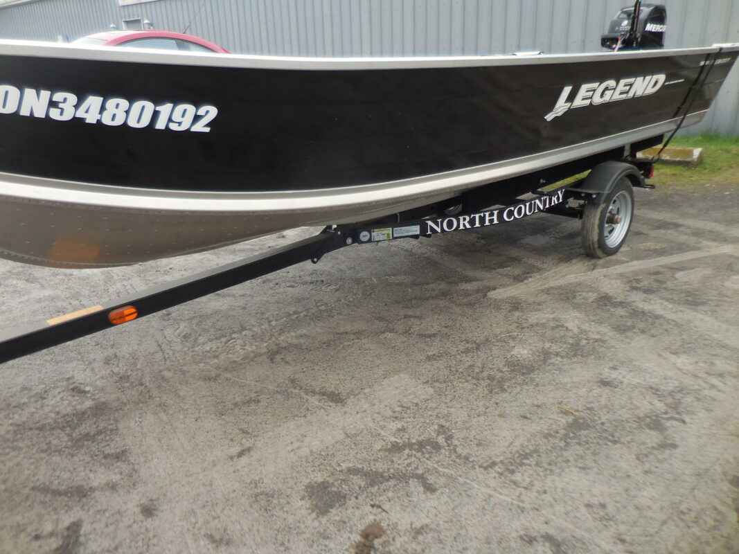 Legend 16 ft. wide bottom aluminum boat with trailer & Mercury 20 H. P. outboard motor